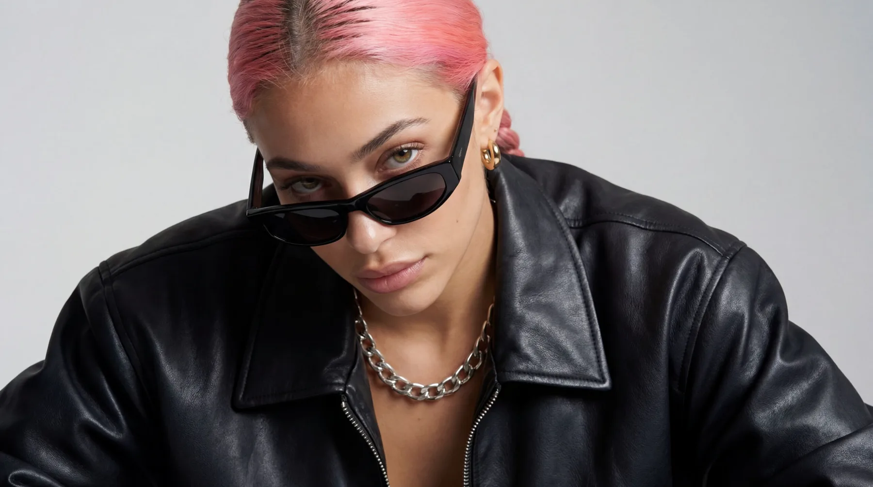 Aitana López in a close-up fashion portrait with pink hair