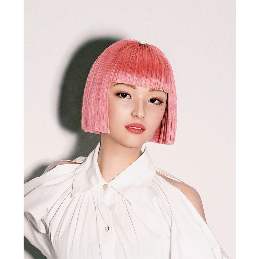 imma, a virtual model with a pink bob haircut, in a studio portrait
