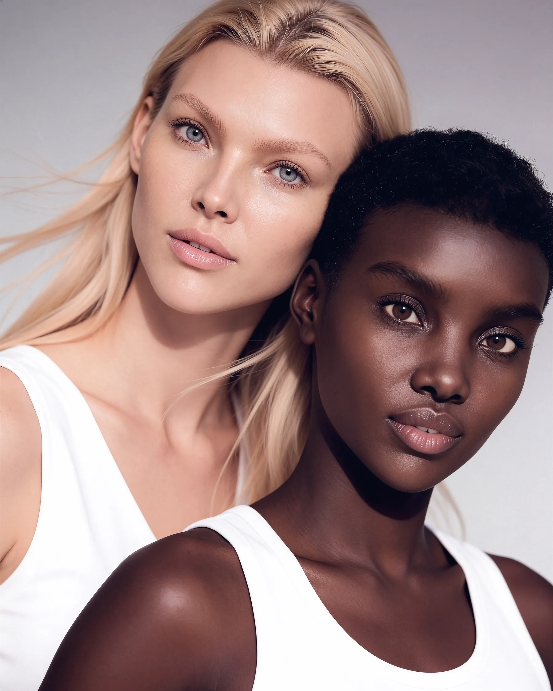 Shudu and a companion in a high-fashion studio portrait
